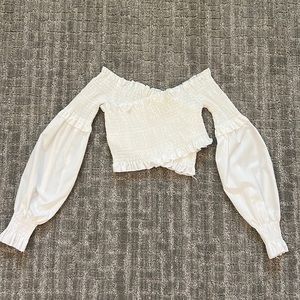 Cropped white strapless top